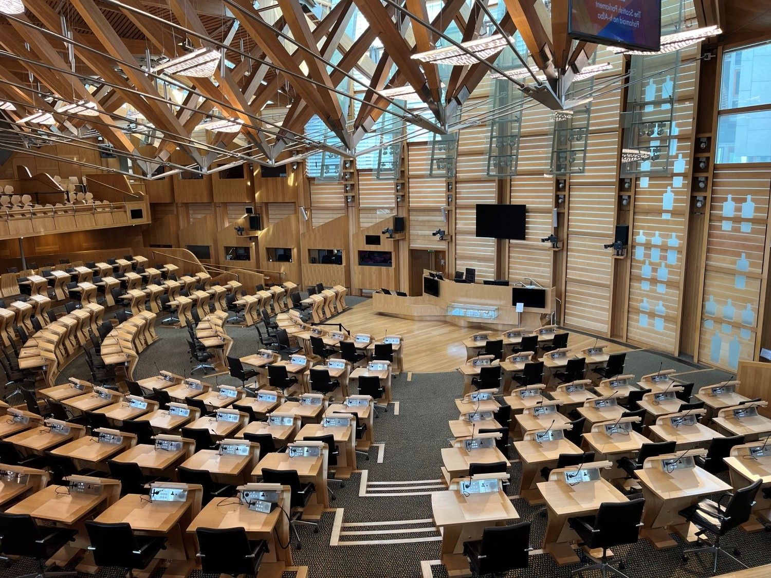 Inside the Scottish Parliament building, looking down for the balcony.